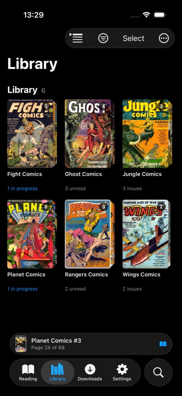 The Library tab grouped by series, each shown as a stack of covers
                      with its issue count.